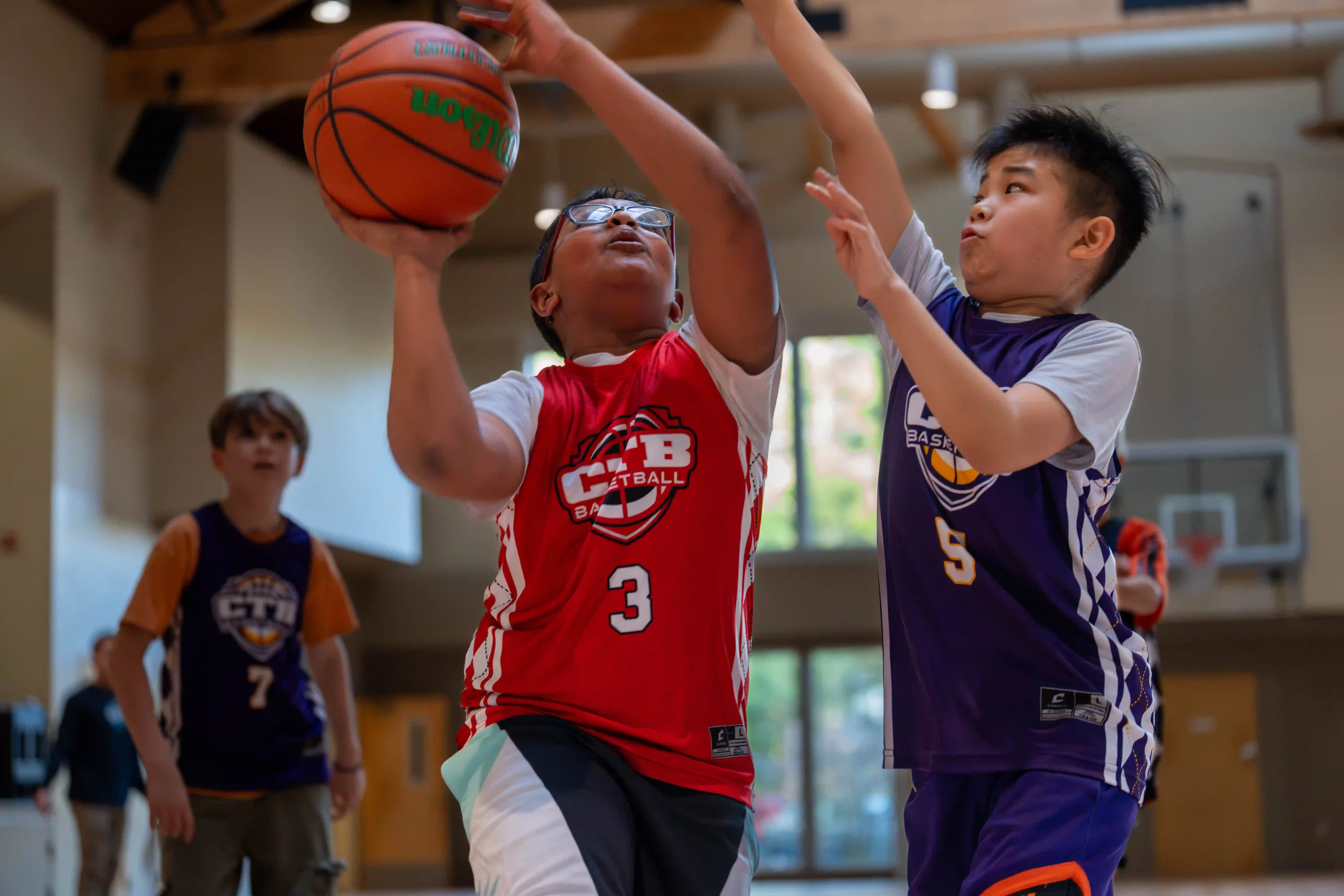 A boy playing basketball